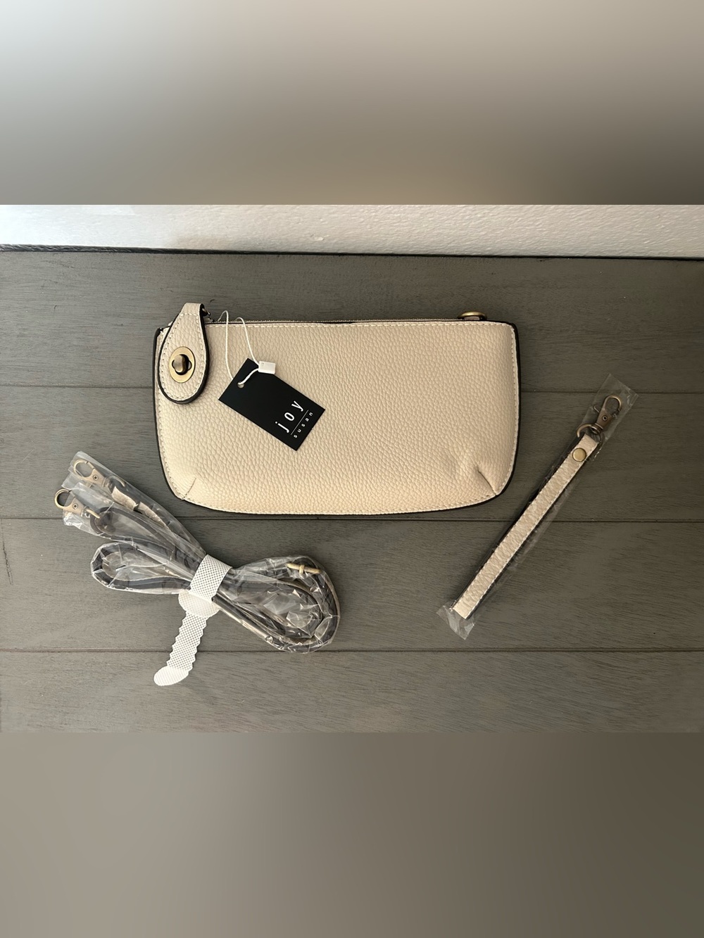 Pebbled Cream Leather Convertinle Wristlet Clutch with Gold-Tone Accent closure